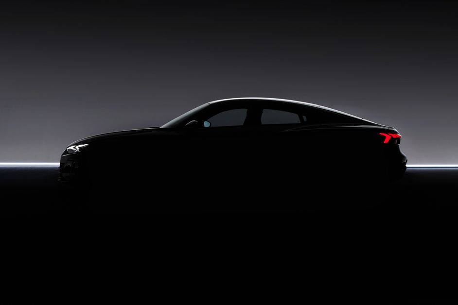 Silhouette of an Audi RS e-tron GT on a stage