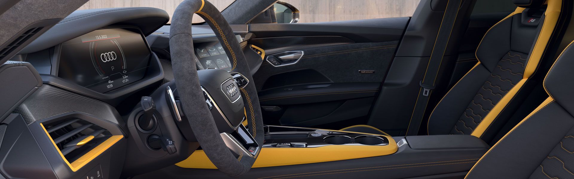 Cockpit of the Audi RS e-tron GT in black and yellow leather