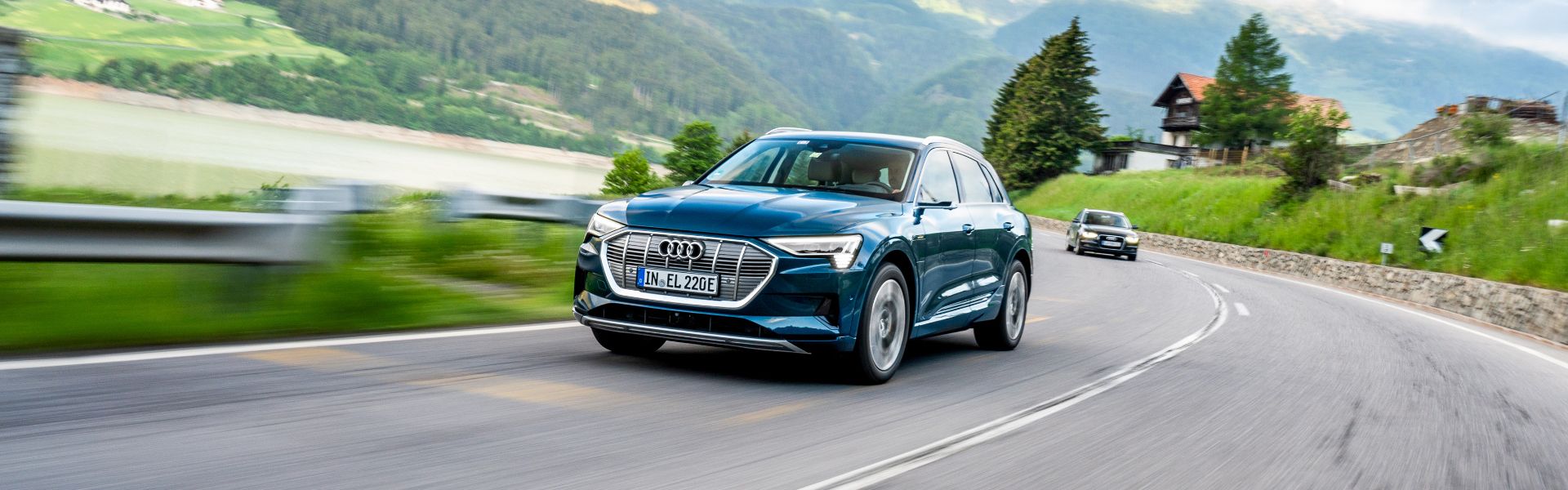 Audi e-tron driving on a country road