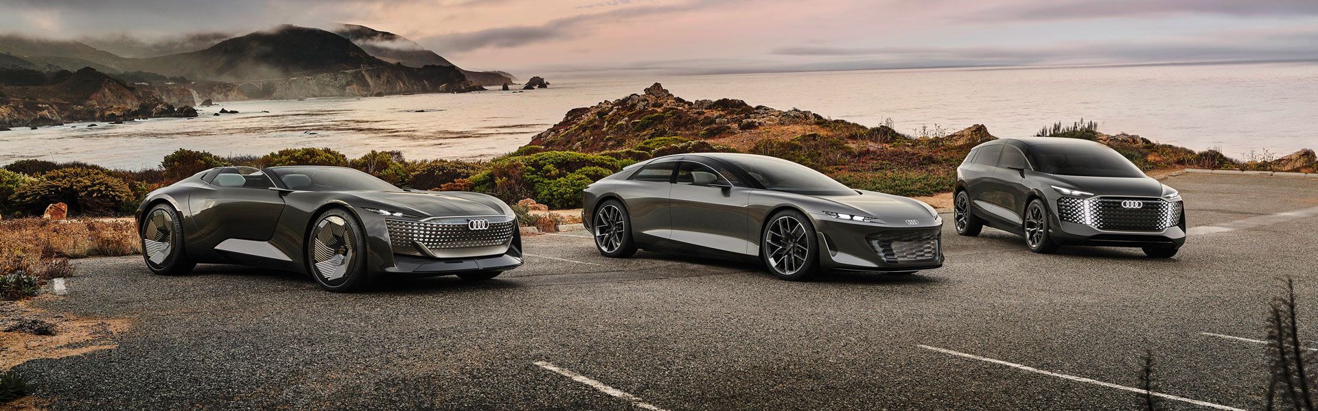 Audi concept cars in front of picturesque coast