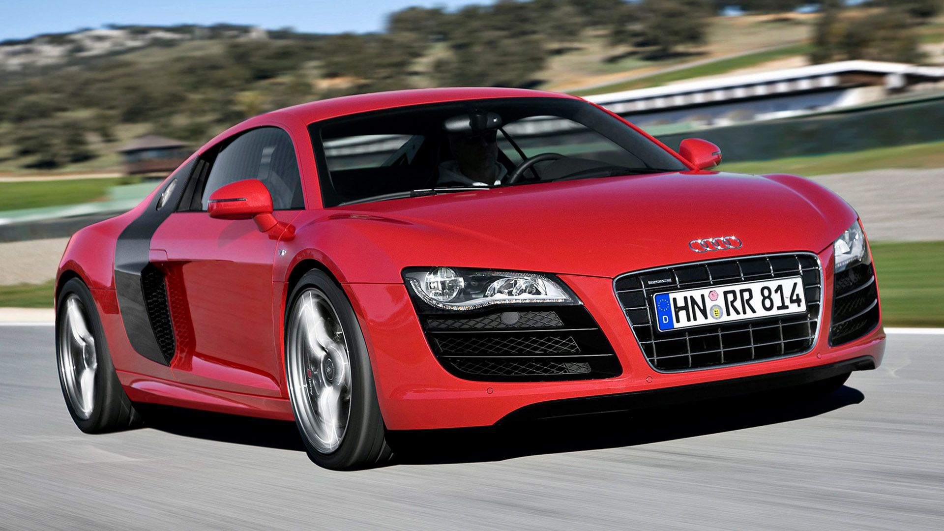 Red Audi R8 Coupé on the carriageway