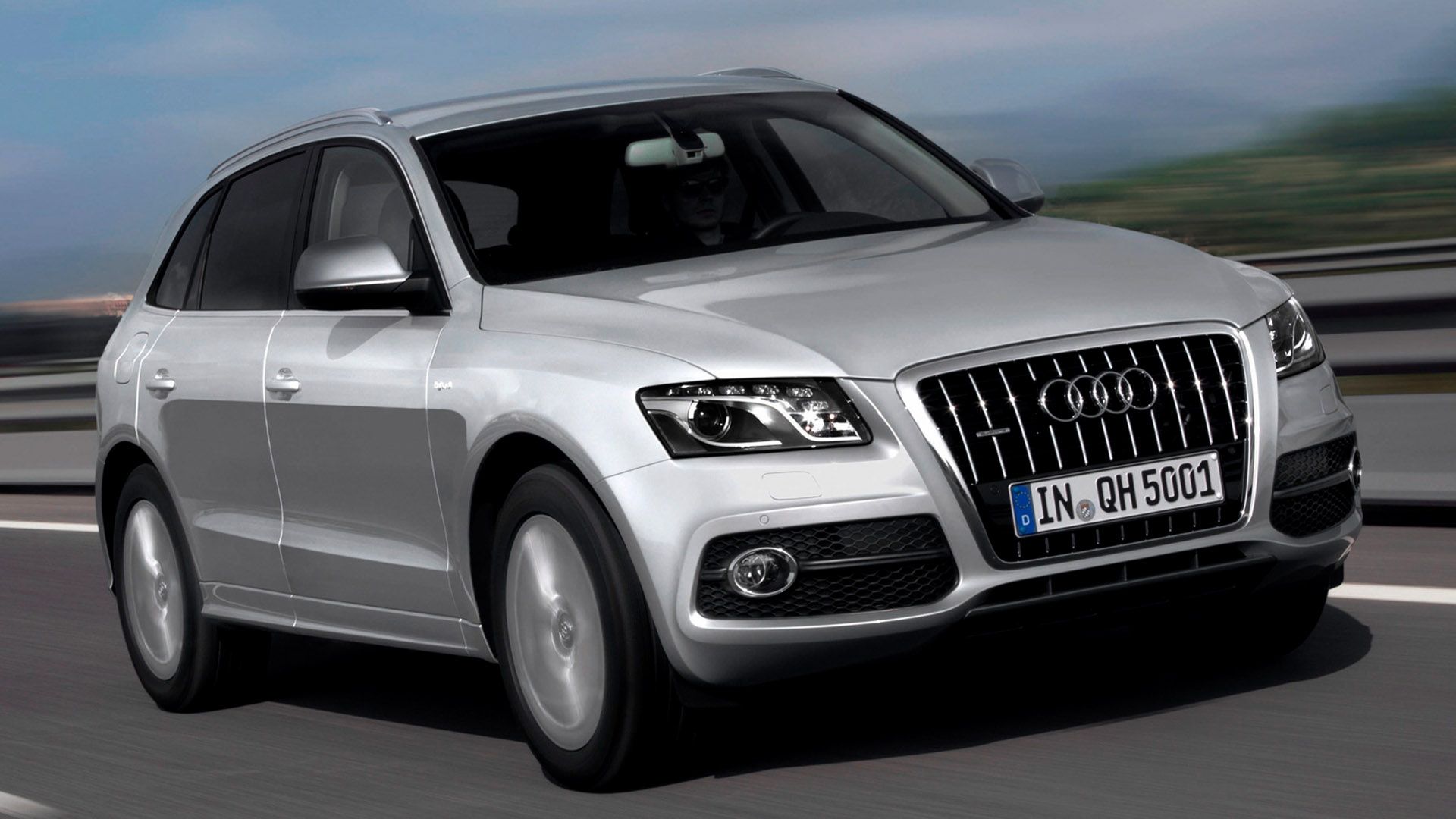 Silver Audi Q5 Hybrid on the road