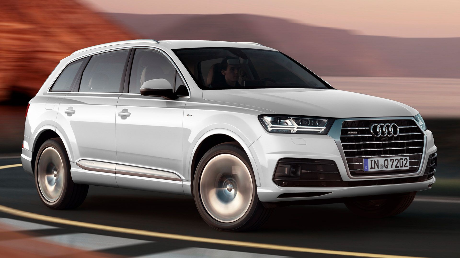 White Audi Q7 on the carriageway in the desert
